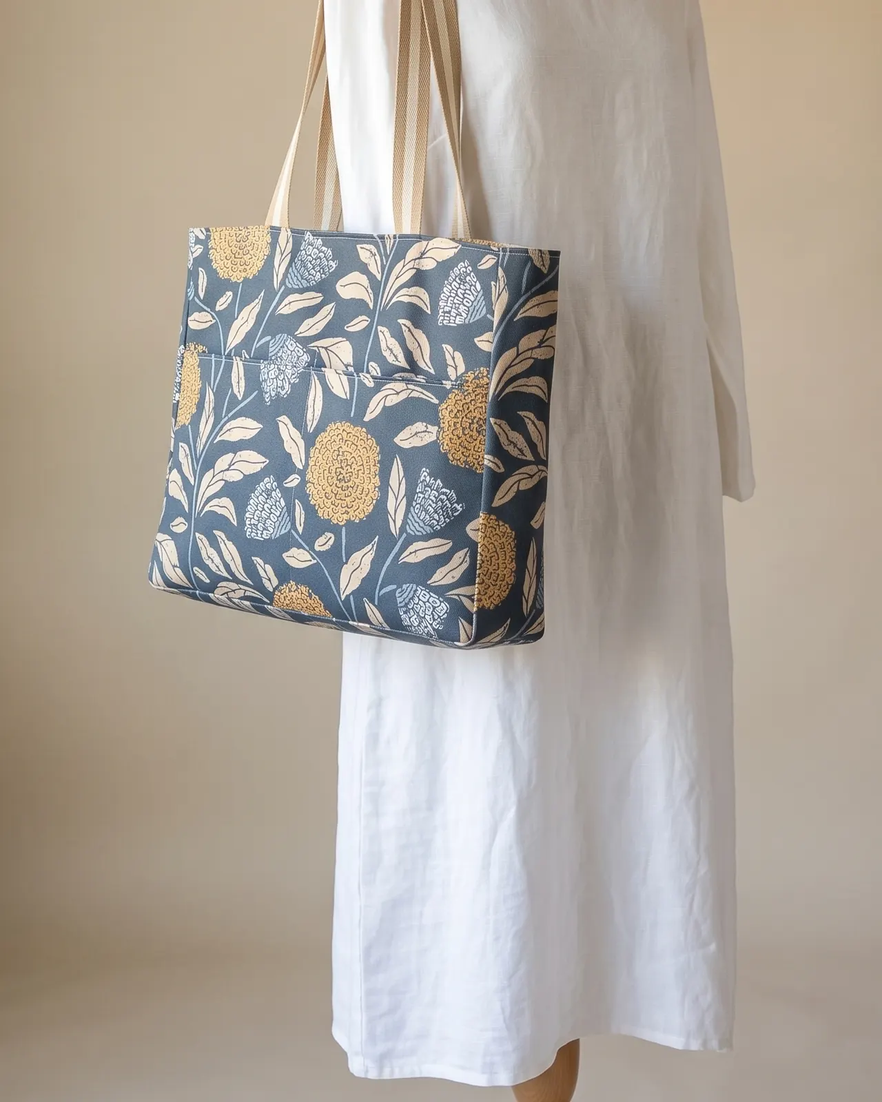 Large Tote Bag - Navy Vintage Floral worn on the shoulder on a display form