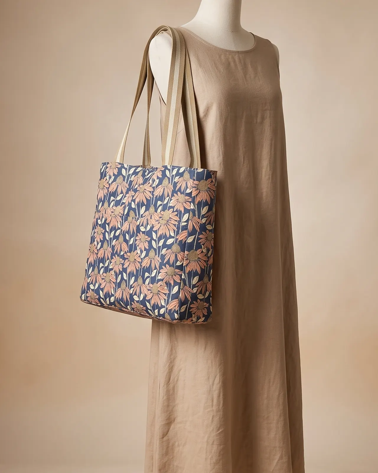 Large Tote Bag Zipper - Navy Pink Coneflower worn on the shoulder on a display form